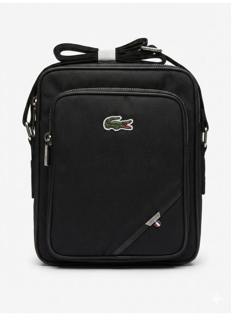 LACOSTE Men's Structured Black Crossbody Bag with Leather Accents & Adjustable Strap - Image 1